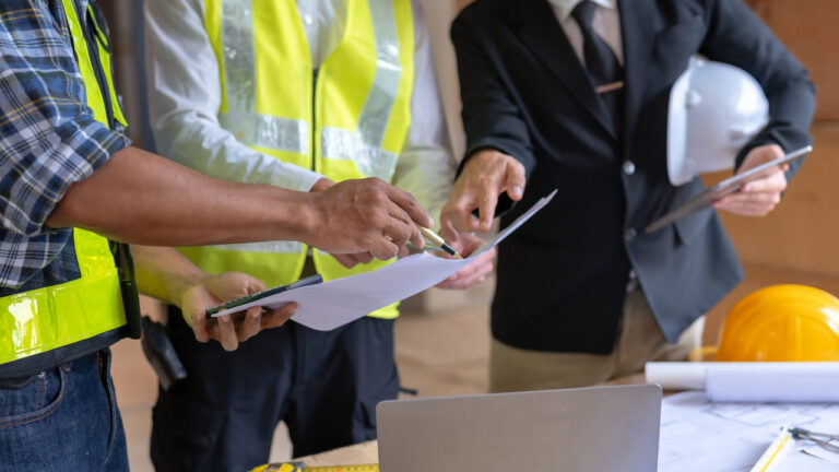 Contractor and Owner reviewing unbudgeted costs new home construction