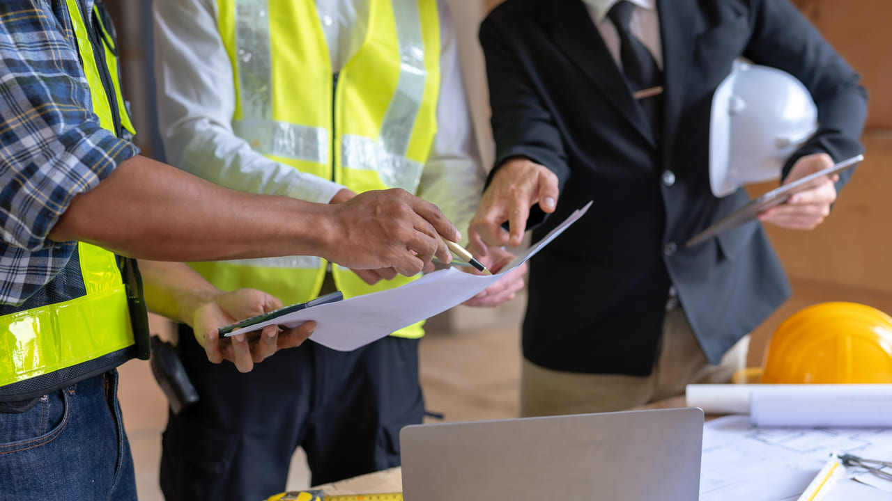 Contractor and Owner reviewing unbudgeted costs new home construction
