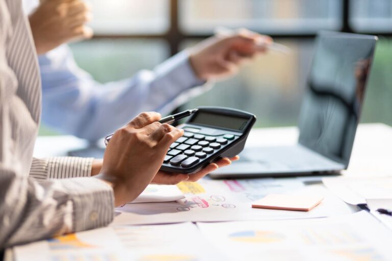 business individuals reviewing construction change order costs